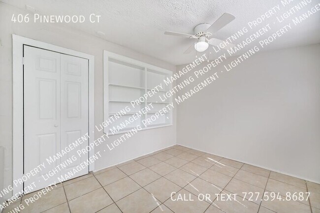 Building Photo - 406 Pinewood Ct
