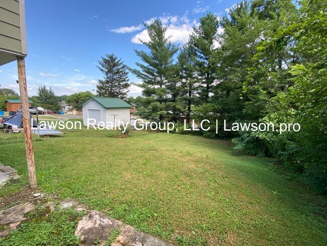 Building Photo - Updated Four Bedroom Home with a Full Walkout Basement
