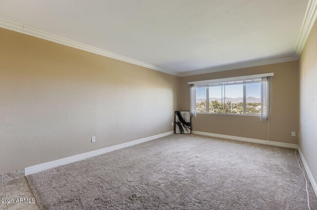 Building Photo - 7970 E Camelback Rd