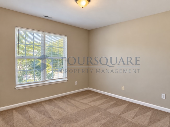 Building Photo - Inviting Townhome with En-Suite Secondary Bedroom, Back Patio & Community Pool – Raleigh Location