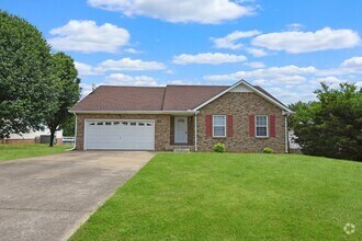 Building Photo - Pet Friendly Three Bedroom with Bonus!