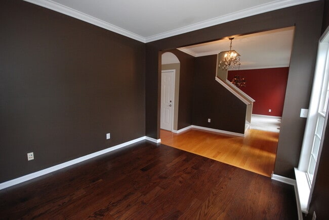 Building Photo - Oversized Executive Style Home with Finish...