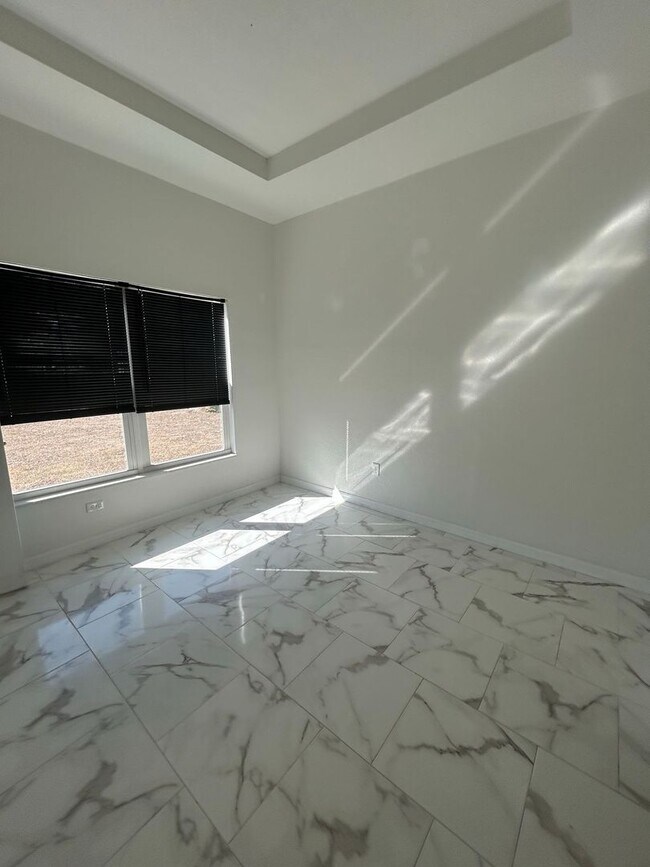 Building Photo - SPACIOUS 4 BEDROOM- 2 BATHROOM RETREAT IN BEAUTIFUL LAKE PLACID