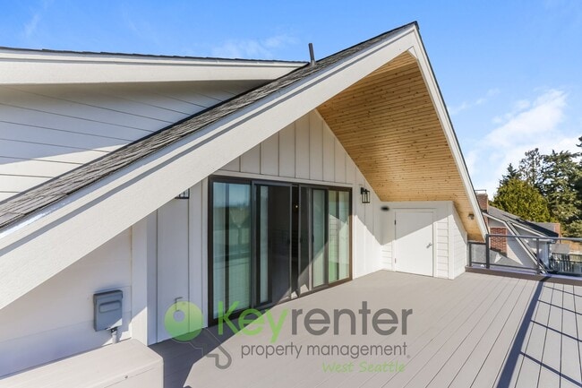 Building Photo - Spacious Living with Balconies, Deck, and Private Yard