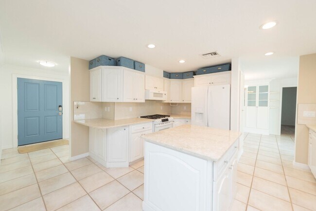 Building Photo - Live the ultimate Space Coast waterfront lifestyle at this stunning beachside canal home in Satel...