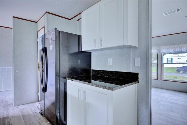 Building Photo - 8595 NW 13th Ct