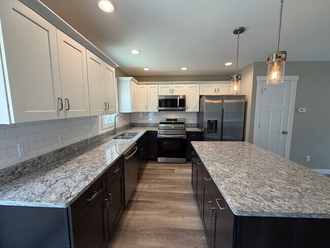 Building Photo - Leicester - Immaculate Three Bedroom with Huge Backyard