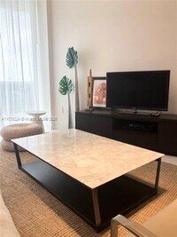 Building Photo - 15811 Collins Ave