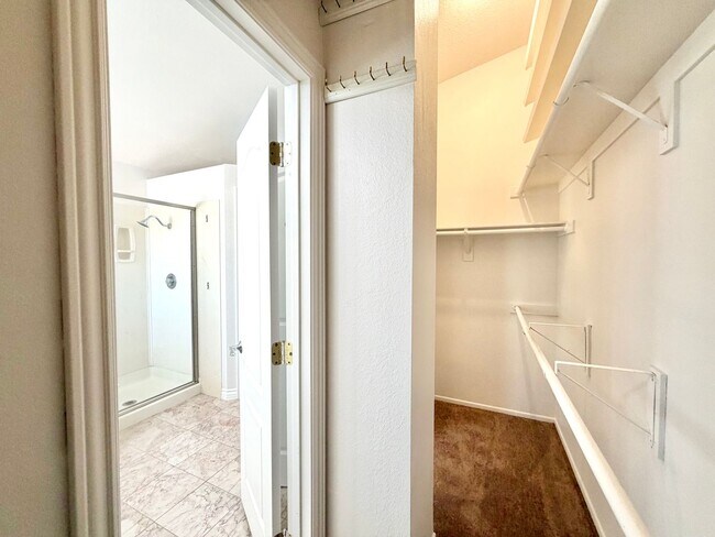Building Photo - Open-Concept 3 Bedroom 2.5 Bathroom Home with Soaring Ceilings & Spacious Backyard
