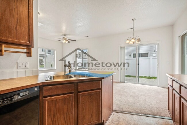 Building Photo - Townhouse Style Home with 3 Bedrooms, 2.5 Bathrooms, and a 2-Car Attached Garage Available in Coe...