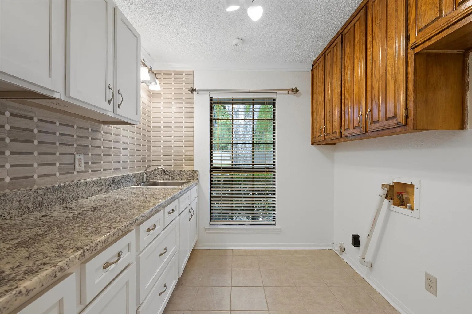 Laundry Room With Deep Sink and Granite Topped Hobby or Work Area - 273 Leafy Hollow Ln