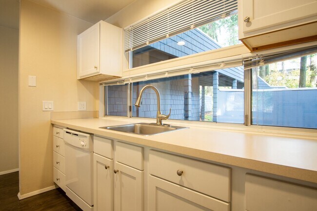 Building Photo - Gorgeous & Bright 1-Bed w/ Wood-Burning Fireplace, W/D, & Private Patio!