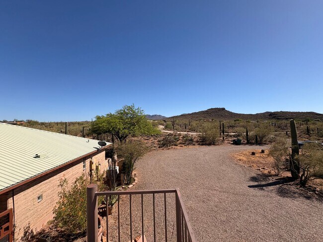 Building Photo - Desert Home on 3.3 Acres with Rooftop Views & Unique Rammed Earth Design