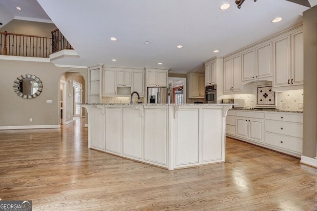 Building Photo - 9485 Nesbit Lakes Dr