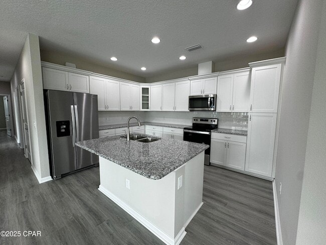 Building Photo - 9022 Parrot Pl