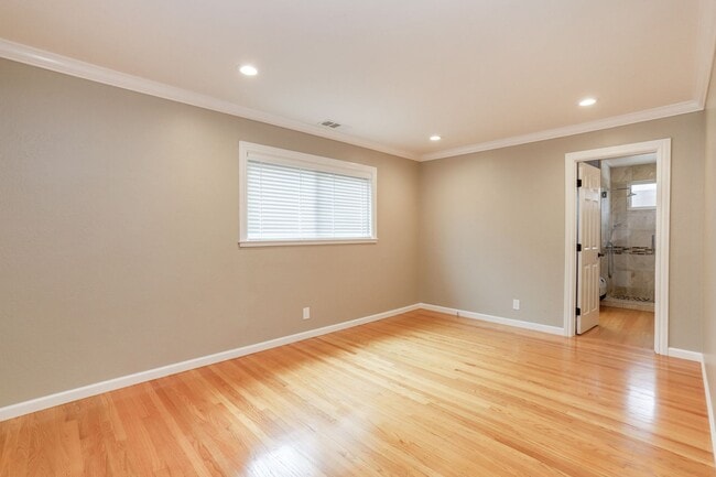 Building Photo - 4BR/3.5BA Belmont Home with Multiple Ensuite Bedrooms, A/C & 2-Car Garage | YouTube Tour