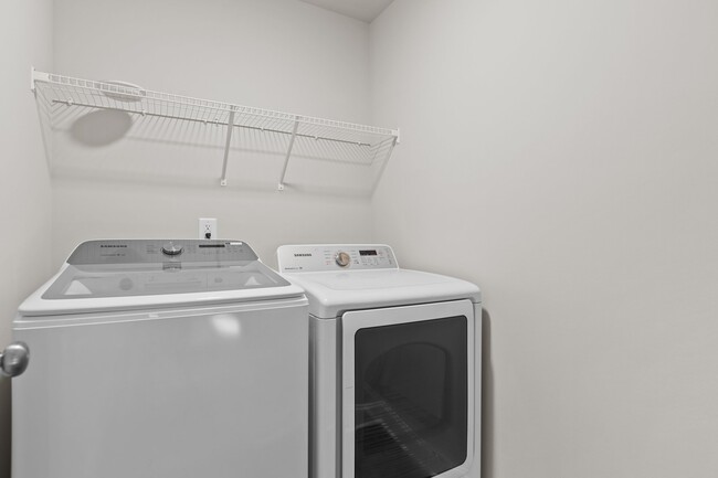 Laundry room upstairs - 105 E Carolina Ave