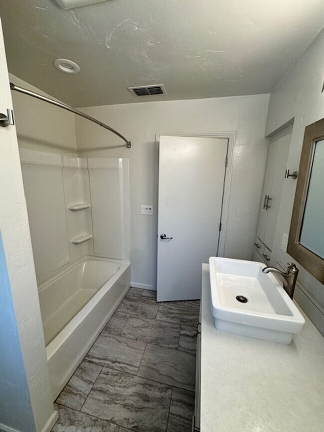 Building Photo - Charming Updated 4-Bedroom Home in the Garden Tract – Hardwood Floors, Central Air, 2-Car Garage ...