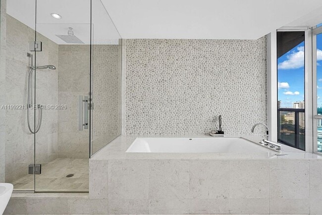 Building Photo - 17121 Collins Ave