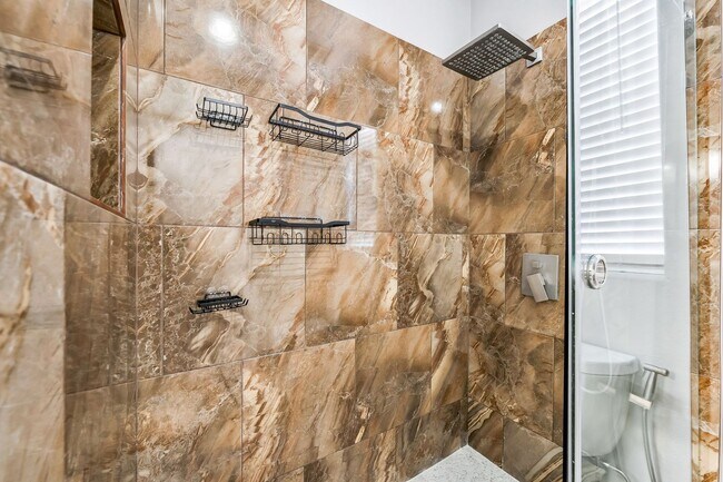 Building Photo - Fully Furnished Luxury Living with Expansive, Move-In Ready Comfort!