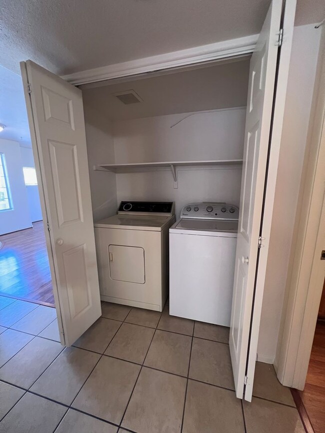 Building Photo - TWO BEDROOM CONDO WITH TWO CAR GARAGE IN H...