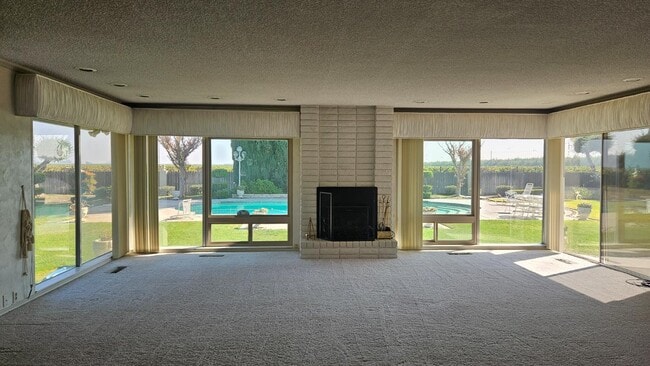 Building Photo - 7686 S Temperance Ave