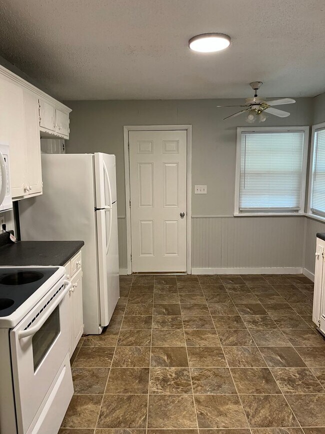 Building Photo - Step inside!  You will love what you see. COMING SOON