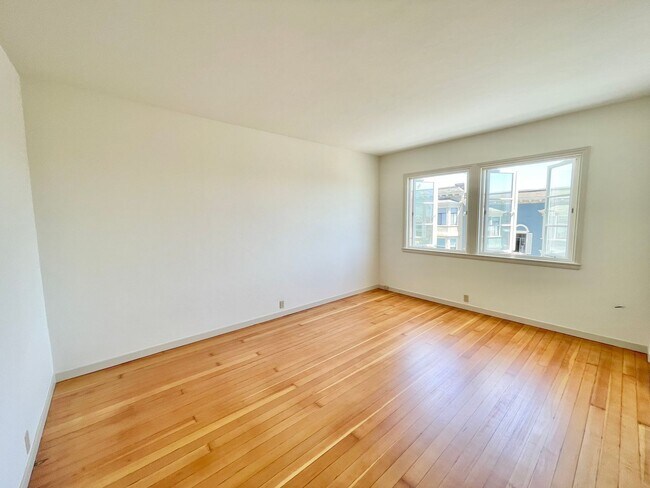 Building Photo - Bright and Airy 2 Bedroom Penthouse in the...
