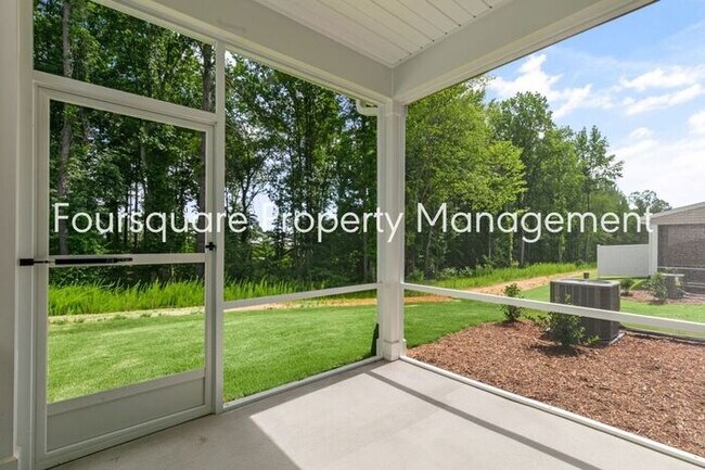Building Photo - Coming Soon; July 27, 2026 : End unit ToSpacious End-Unit Townhome with 2nd Floor Loft, Screened-...