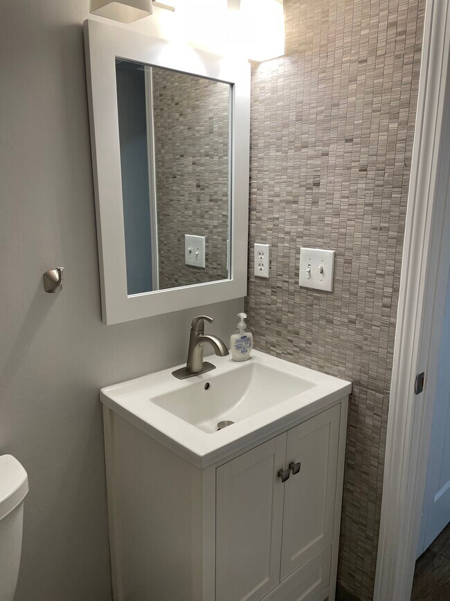 Recently updated downstairs powder room - 33 Deer St