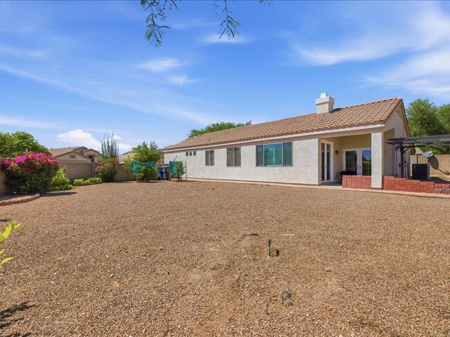 Building Photo - Spacious Living in a Gated Community with Amenities!