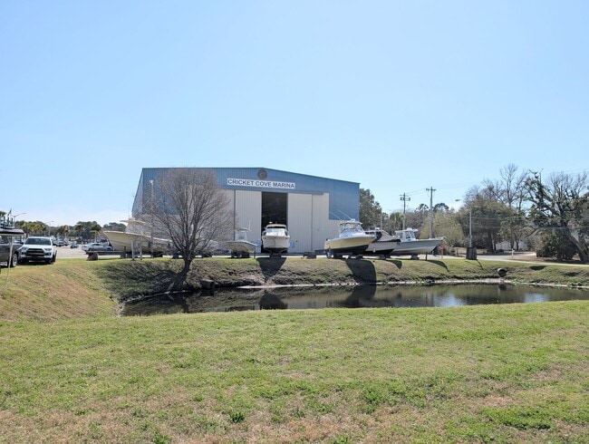 Building Photo - Dreamy Little River Condo — Furnished, Elevator Access, Pool & Marina Nearby!