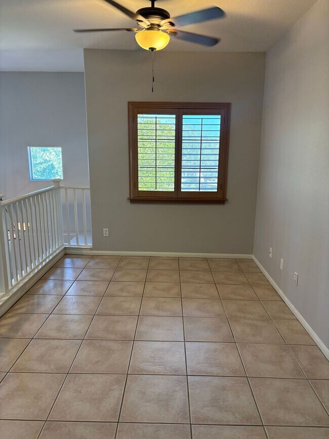 Building Photo - Gated Green Valley Ranch Townhome | 2 Bed | 2.5 Bath | 2-Car Garage