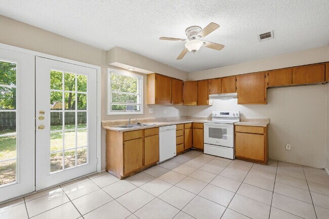 Building Photo - "Charming 2-Bedroom Duplex in White Settlement!"