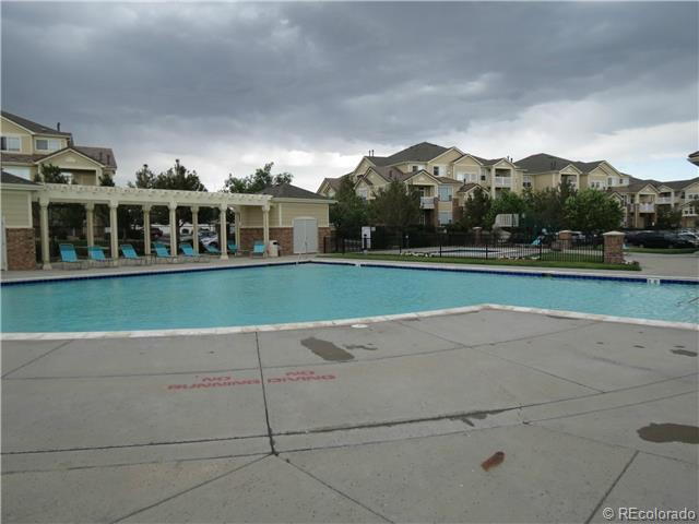 Building Photo - NEW CARPET NEW PAINT!! Clean and Bright 2BR 2BTH Condo Close To DIA. Gated Community in First Cre...