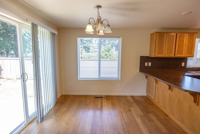 Building Photo - Three bedroom home in Orchards. - Central Air