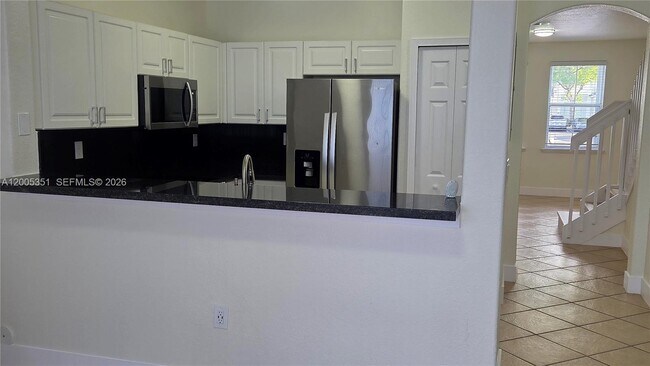 Building Photo - 5440 NW 107th Ave