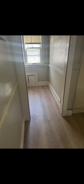 New floor in kitchen and oantry - 6821 W Lloyd St