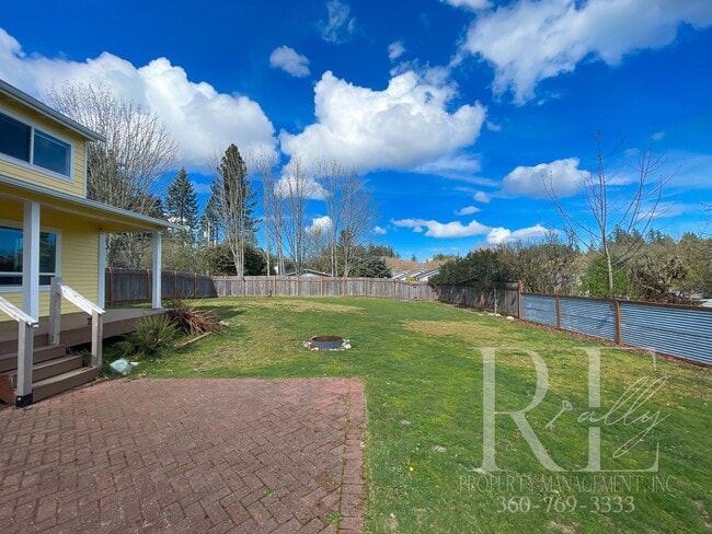 Building Photo - Whimsical Craftsman with Wraparound Porch, Bonus Room & Liberty Bay Peek Views