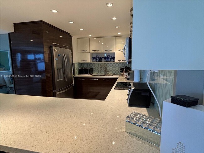 Building Photo - 9511 Collins Ave