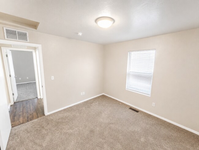Building Photo - Easy-Living 3 Bed, 2 Bath Home with Double Garage, Pool Access & Private Courtyard