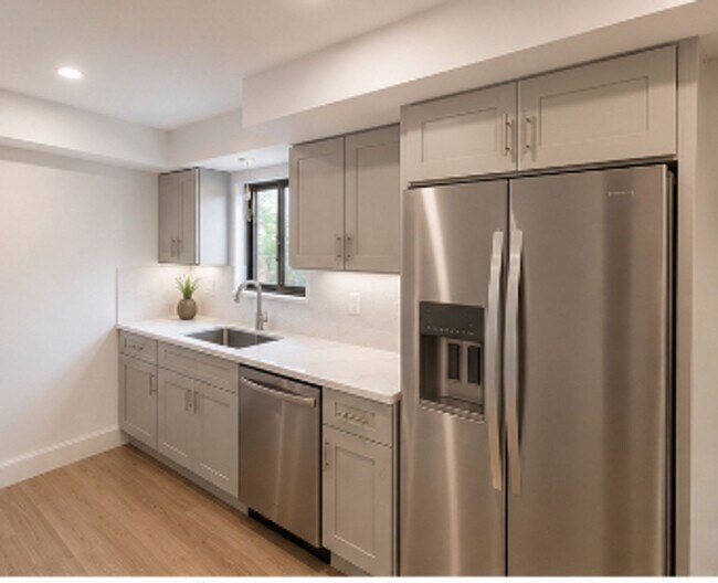 Building Photo - Modern Pet-Friendly 2BR in Washington Square with Parking, Balcony & In-Unit Laundry