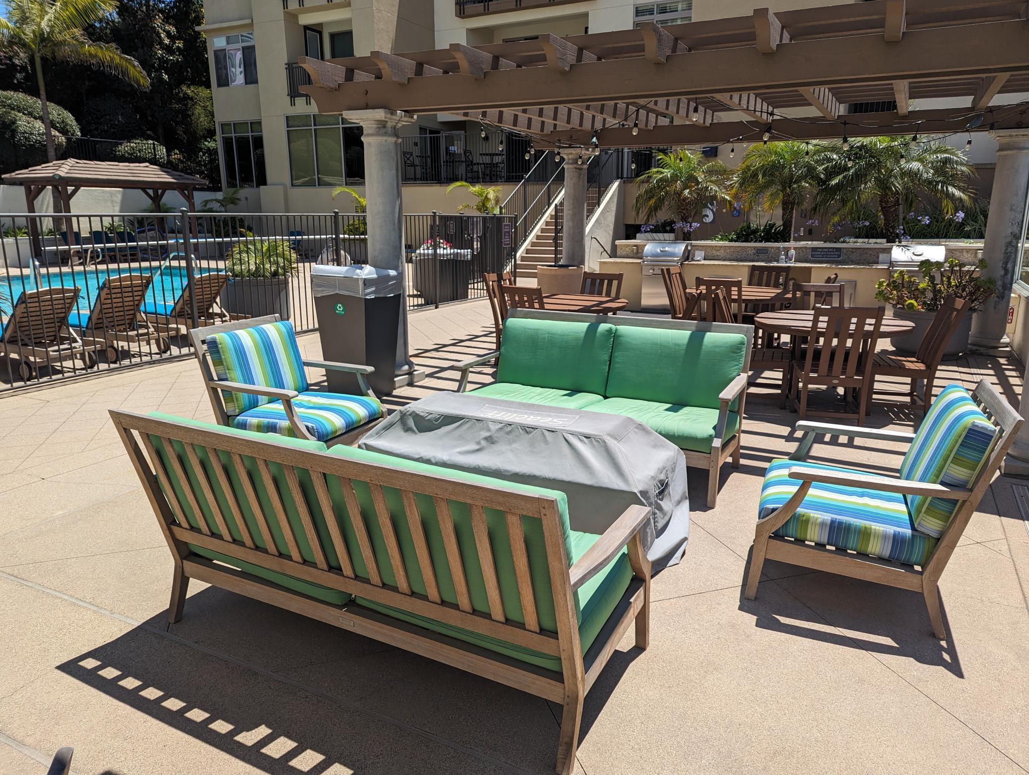 Community patio area with fire pit, BBQs - 1021 Costa Pacifica Way