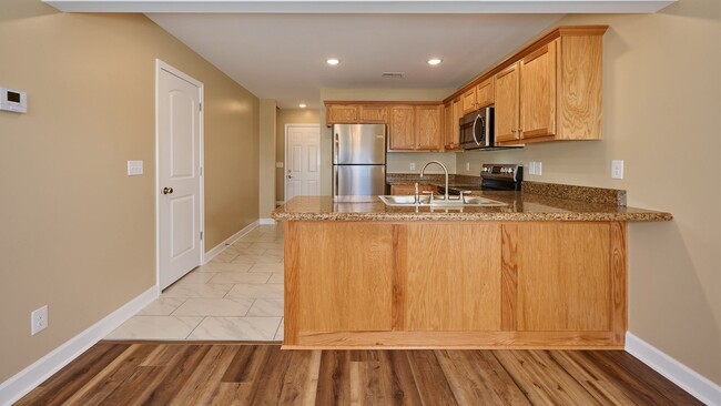 Building Photo - Now Showing: 2BR, 1 1/2BA townhome. (Do no...