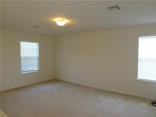 Building Photo - Generous Four Bedroom, Three Bath Home with Large Yard