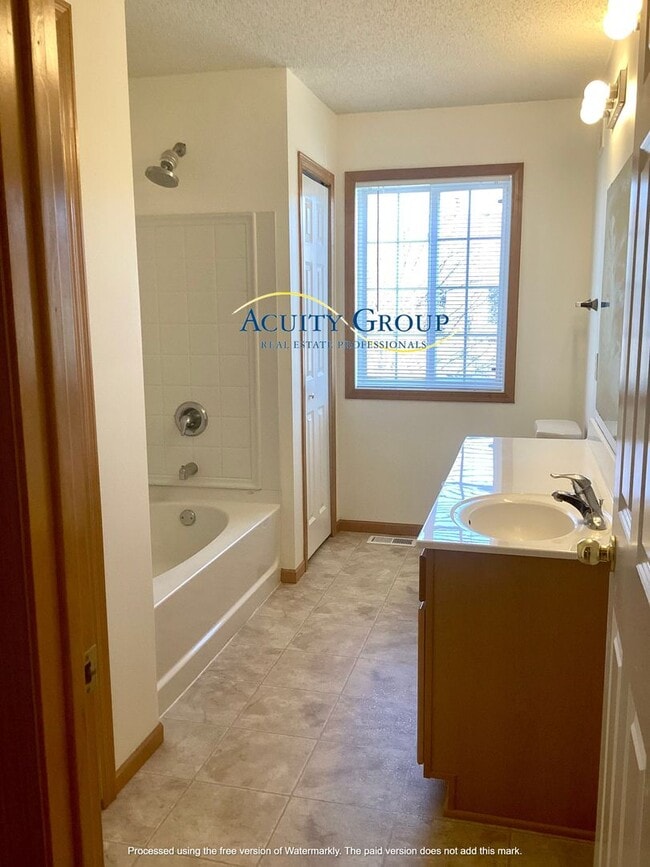 Building Photo - 2 BR, 1 1/2 BA Townhome Move in available as soon as 6/18/26!