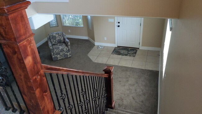 Headed up stairs - 122 S Tamarak Cir