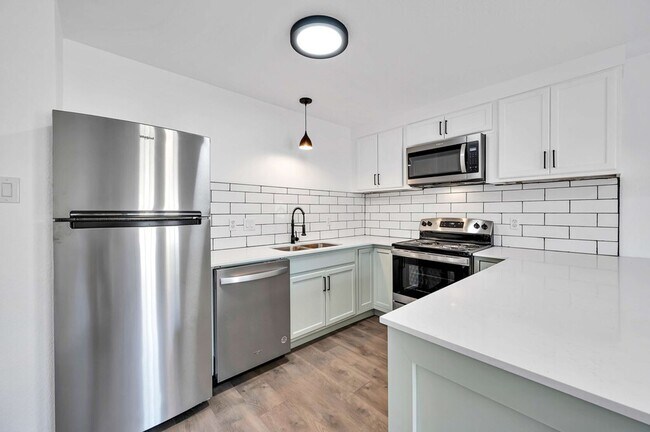 Building Photo - 5311 Tennyson Dr