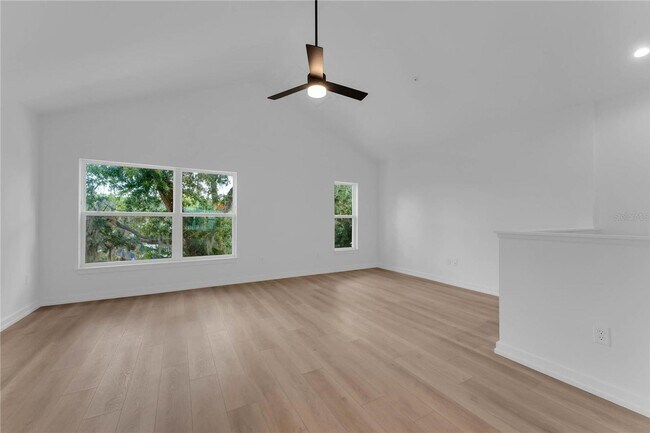 Building Photo - Available Now: 3-story townhome new constr...