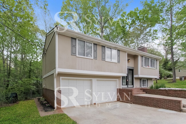 Building Photo - Turn the key. Enter. Smile. Repeat every day!